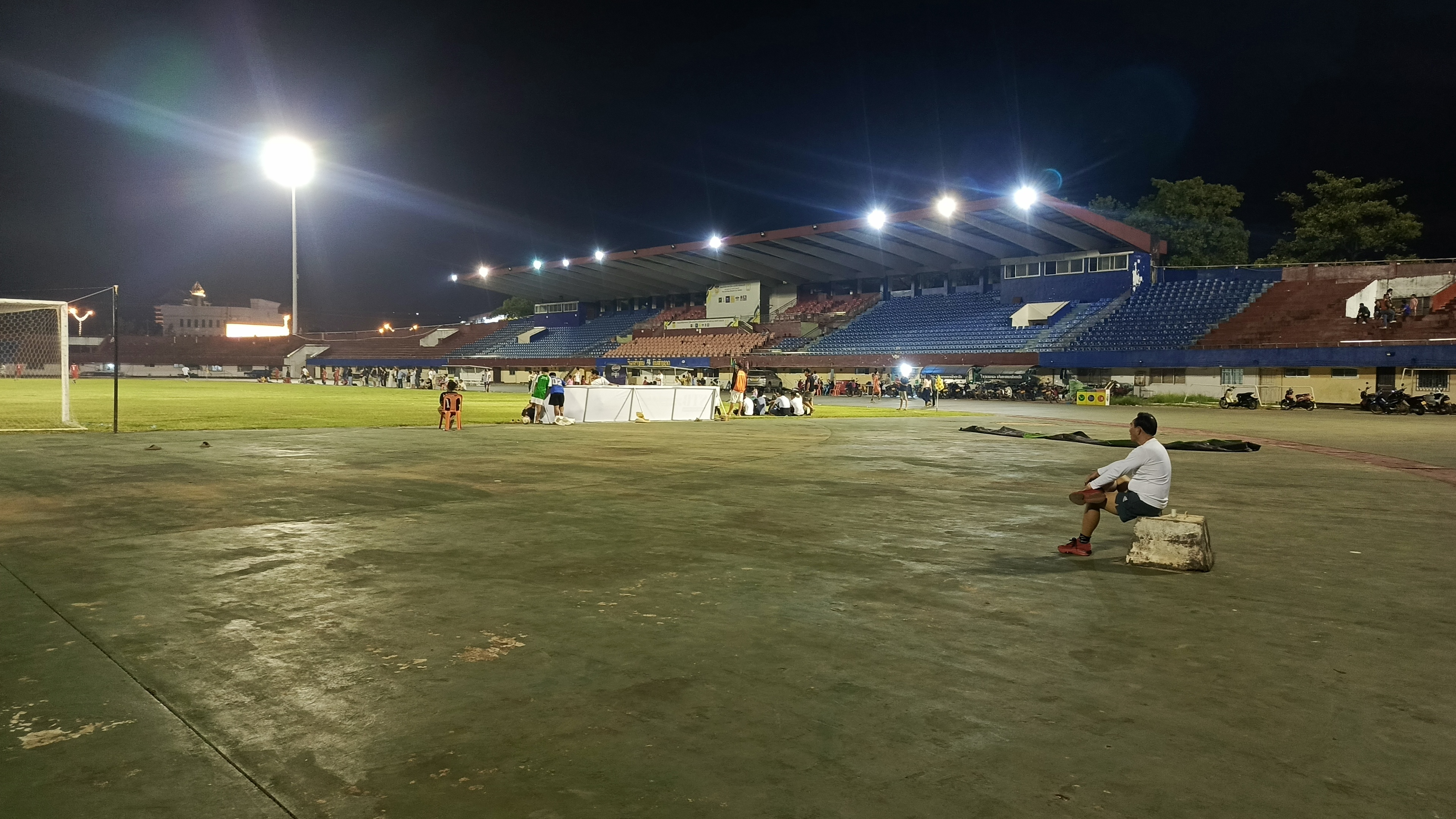 Night football match inside a stadium